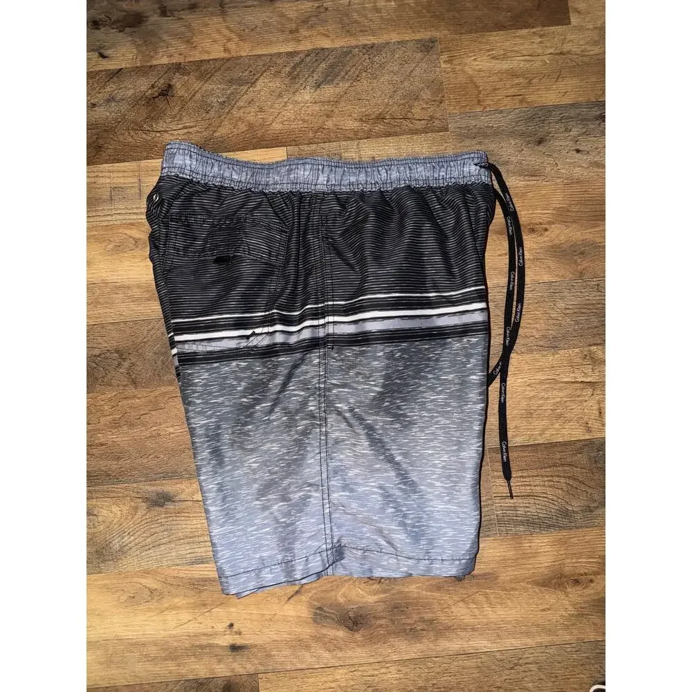 Calvin Klein men’s grey& black swim trunks